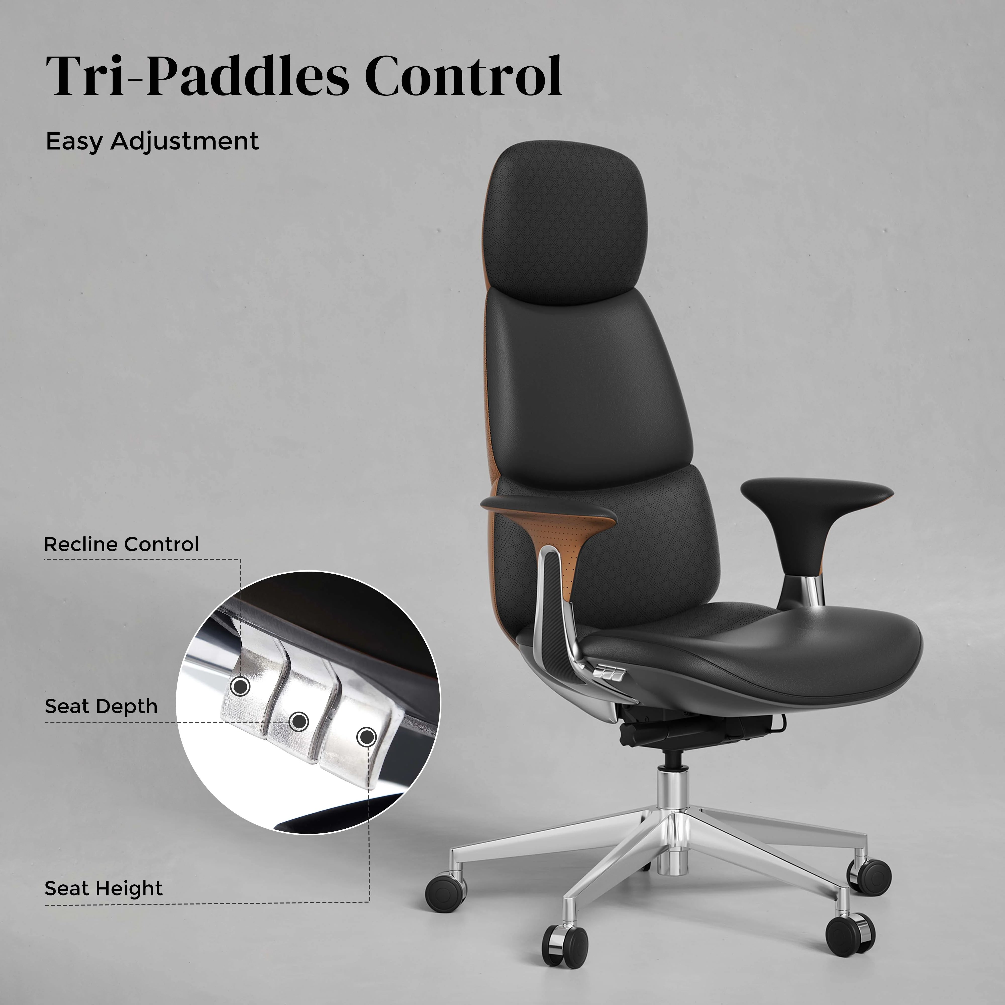 Black leather office chair with recline controls and silver wheeled pedestal base